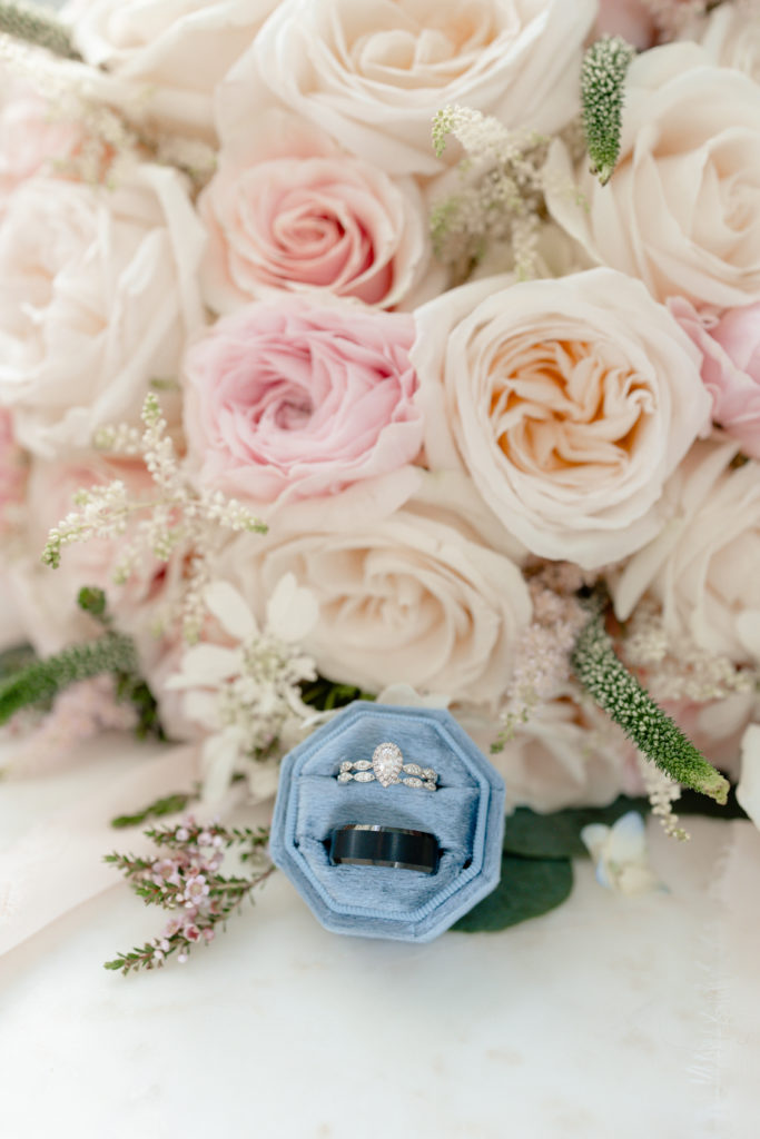 rings next to bouquet