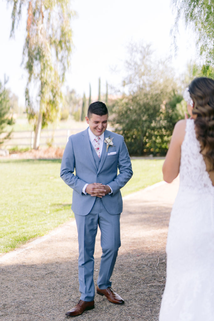 emotional groom reaction to seeing his bride for the first time