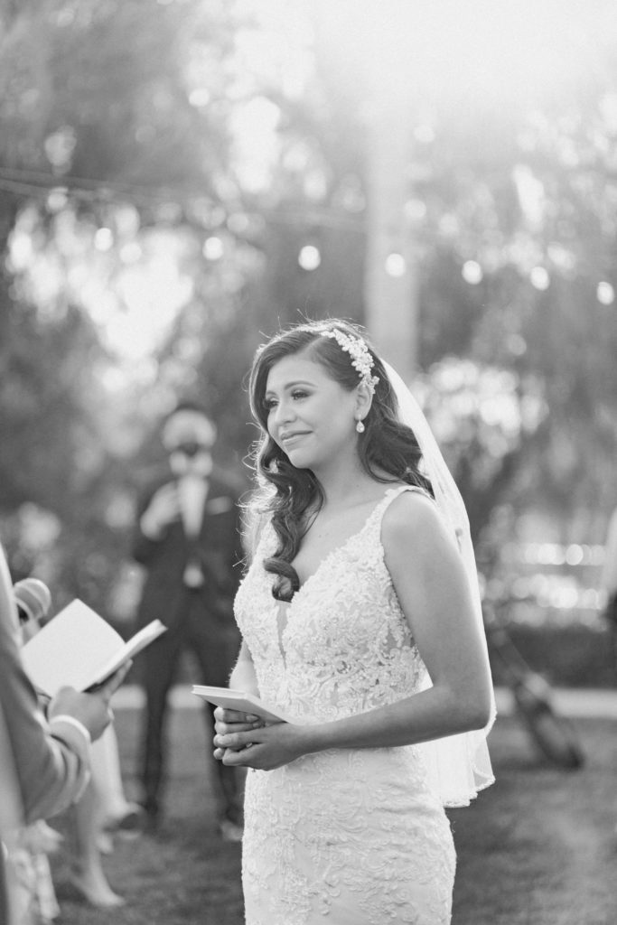 emotional reaction from bride listening to groom's vows