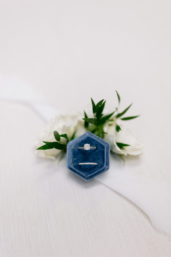wedding rings and boutonneire