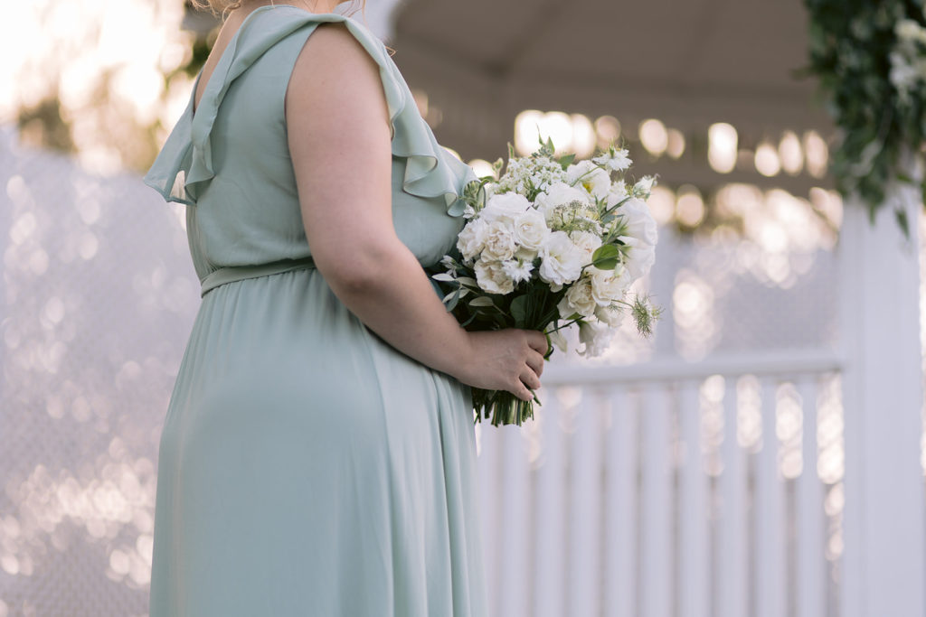 bridesmaid in sage green dress
