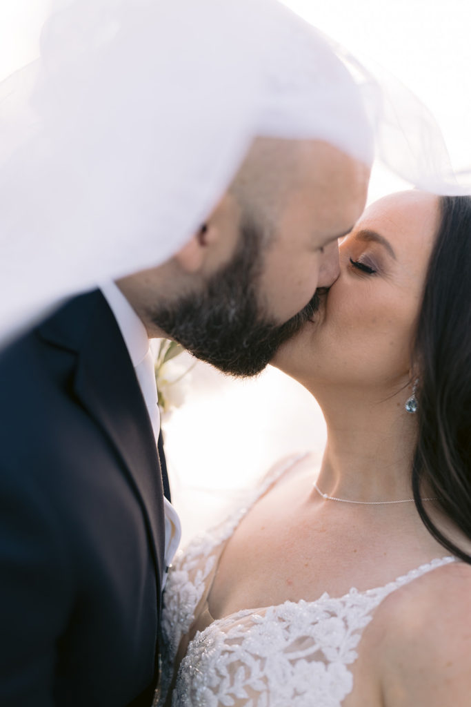 Bride and Groom share a kiss