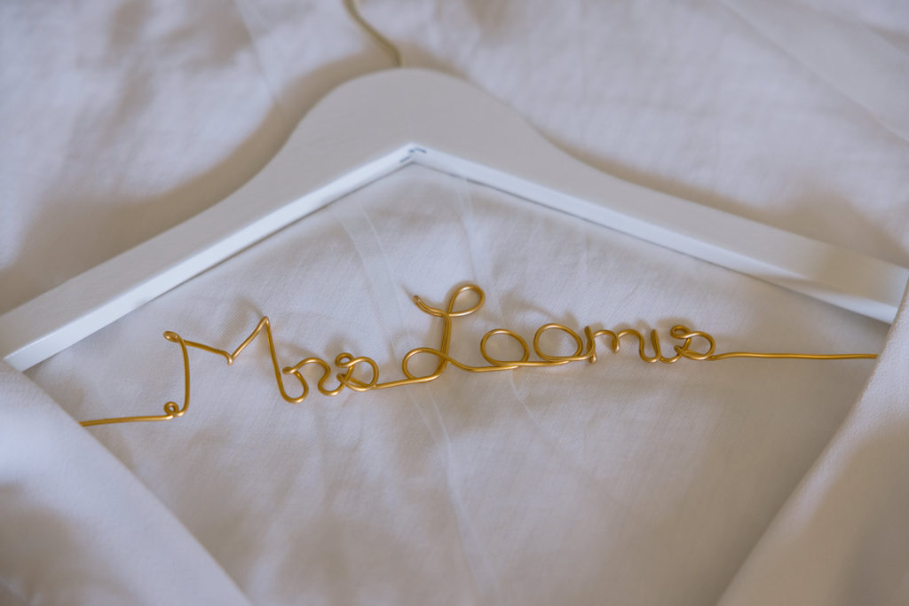 close up of bridal dress hanger