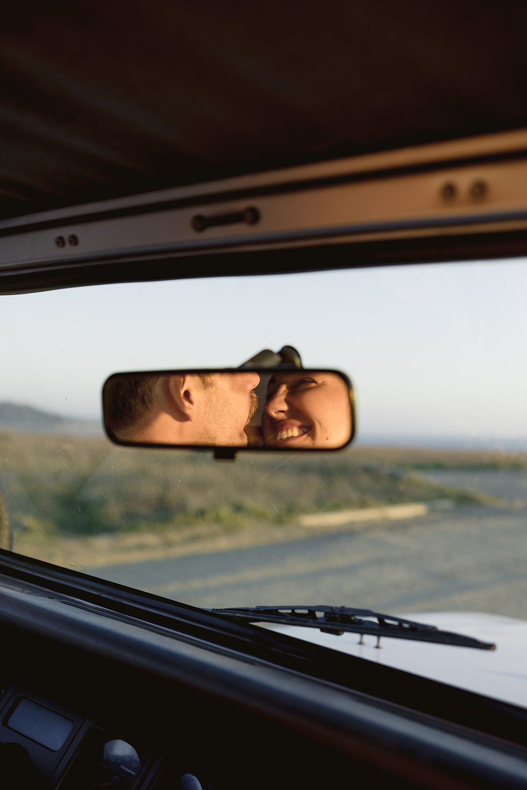 Rearview mirror shot of headlands park engagement session