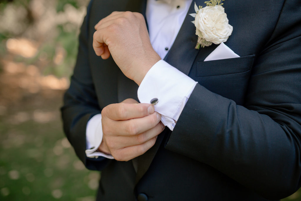 Detail shot of groom's accessories